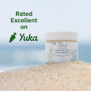 Sea el Skincare Miracle Kelp Eye Cream jar on sand with 'Yuka' rating text.