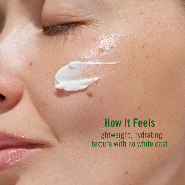 Close-up of a person applying a white cream to their face with text describing the texture.