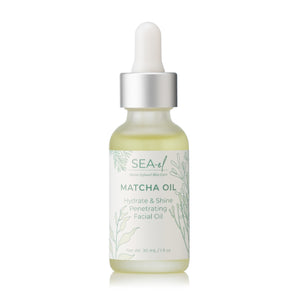 A clear glass bottle with a dropper containing matcha oil, labeled 'MATCHA OIL' with the brand 'SEA El Skincare' below, set against a white background.