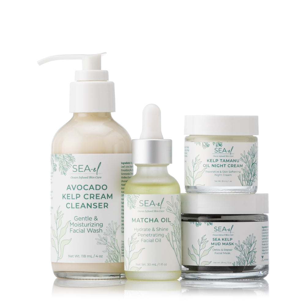A collection of skincare products including a facial cleanser, Facial oil dropper, and two jars, one for skin care masks, and one for hydration all labeled with 'SEA EL SKINCARE.'
