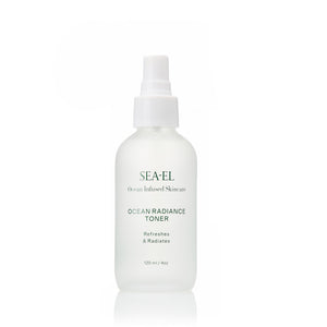 SEA-EL Ocean Radiance Toner in a frosted white spray bottle with a white pump dispenser, set against a clean white background with a subtle reflection.
