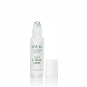 A small cylindrical bottle of SEA-EL Kelp Blemish Stick on a clean white background with a soft reflection below and the cap is off.