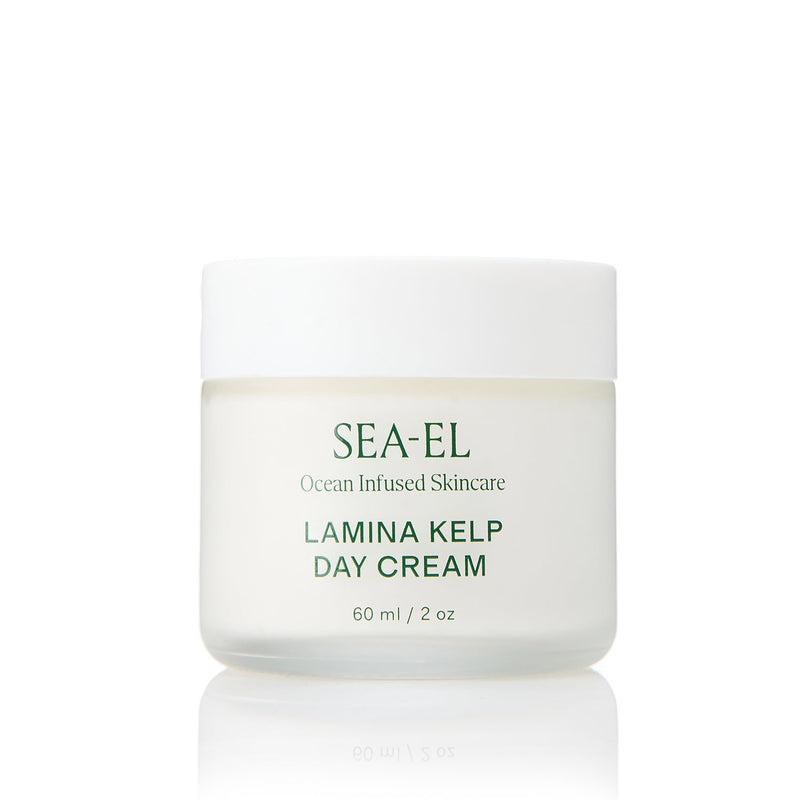 SEA-EL Lamina Kelp Day Cream in a frosted glass jar with a white lid, featuring green text on a clean white background with a soft reflection.