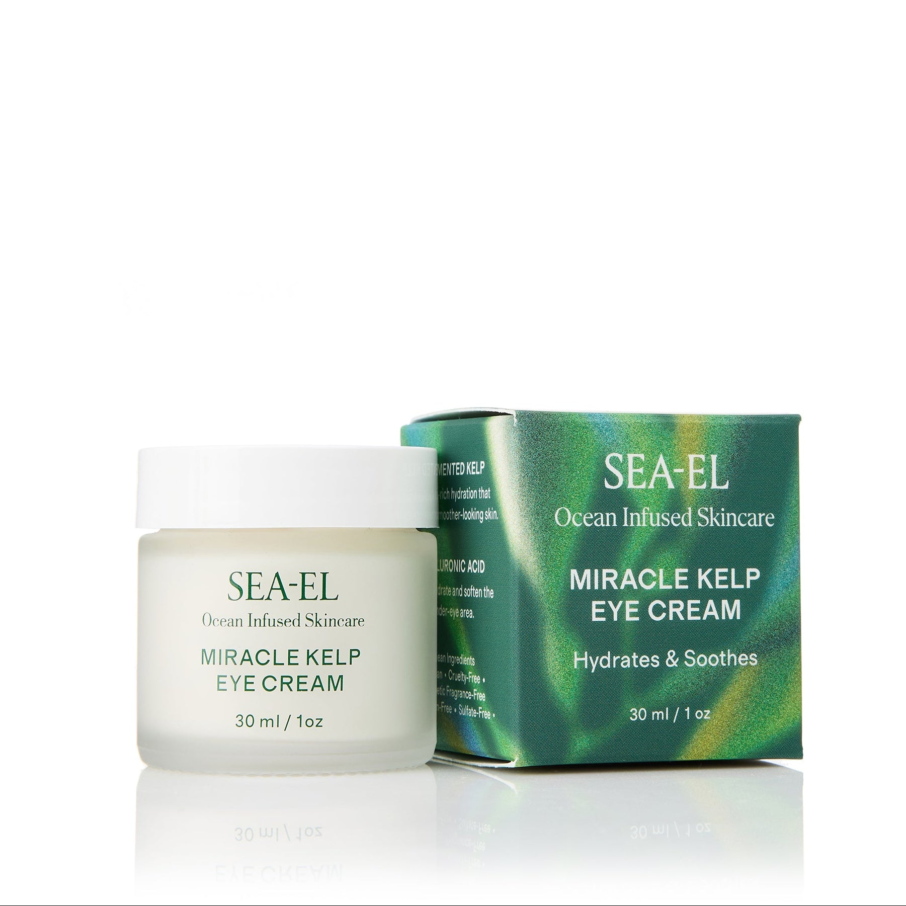 Our eye cream jar sitting along side the box, showing the box with a seaweed artwork on the box.