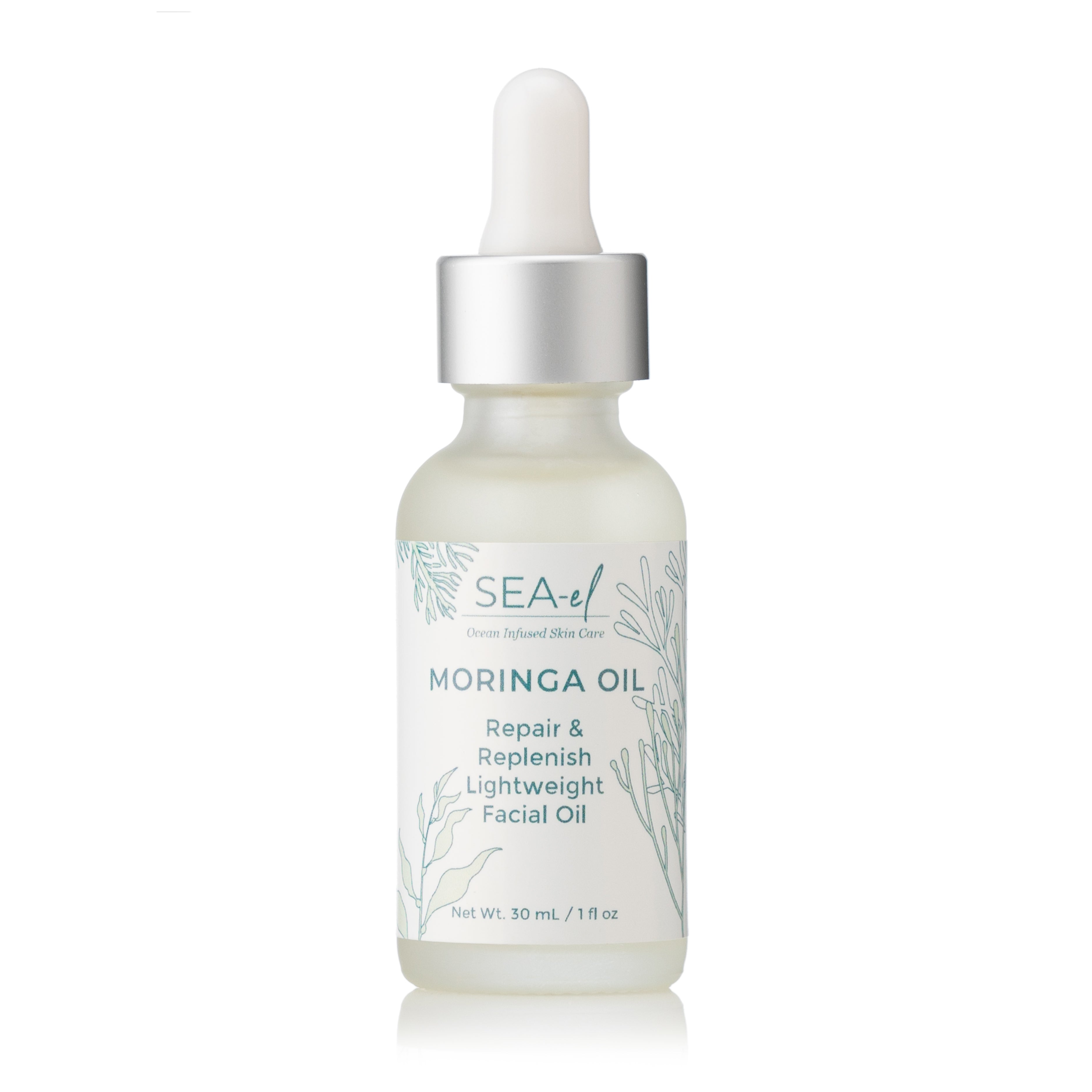 A clear glass bottle with a dropper cap containing Moringa Face Oil, labeled for repair and replenish.